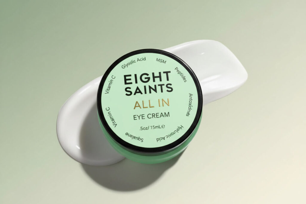 eight saints eye cream for dark circles with hyaluronic acid and peptides in a small white jar